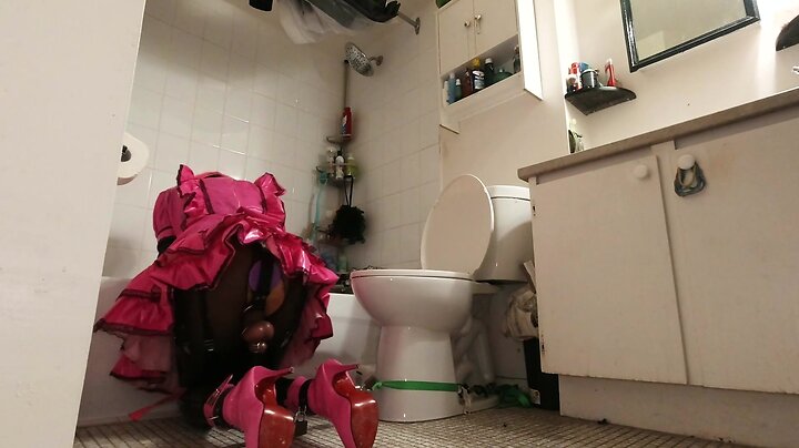 Bathroom bondage: crossdresser maids locked to toilet