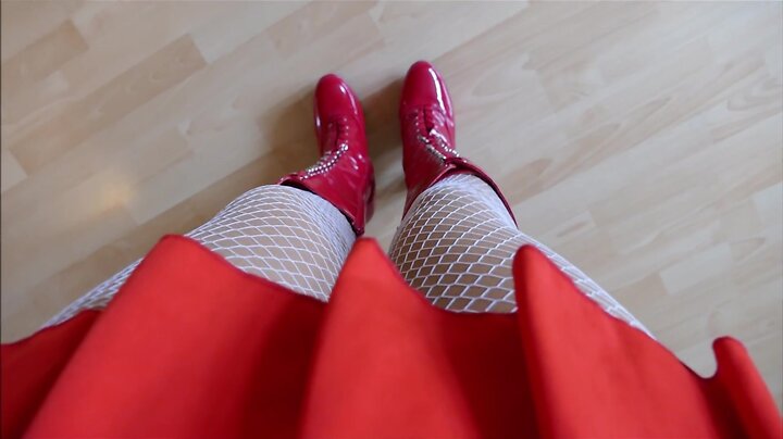 Monique in red hooker boots with rubber dolls