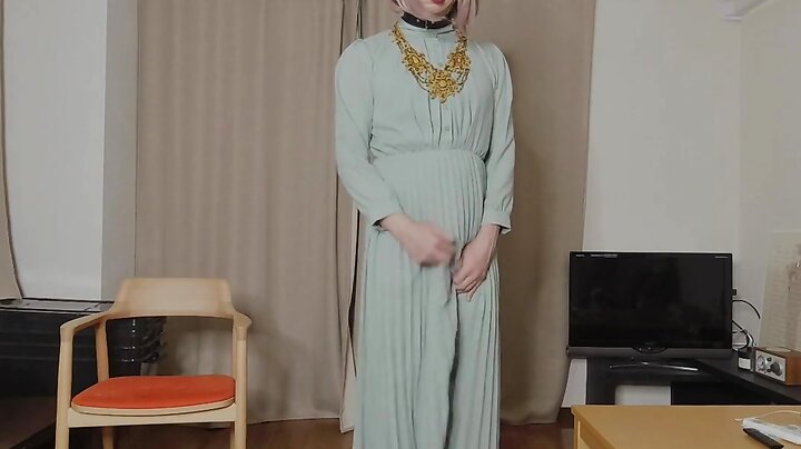 Japanese crossdresser cumshots when excited by genitals touched through long dress